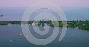 Boats float on surface lake Ontario, Canada. cinematic shot of boats float in lake near airport during day. Enjoy nice