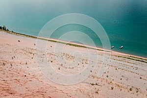 Boats floating at Sleeping Bear Dunes National Lakeshore on Lake Michigan