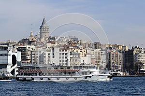 Boats and galata tower photo