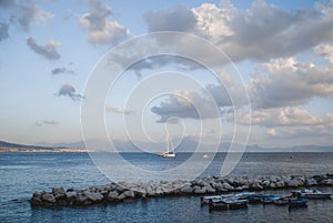 boats in the golf of Naples at sunset