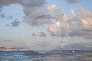 boats in the golf of Naples at sunset