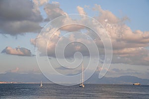 boats in the golf of Naples at sunset