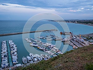 Boats at the harbor of the town of Numana, Conero, Marche, Italy photo