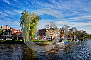 Boats, houses and canal. Harlem, Netherlands