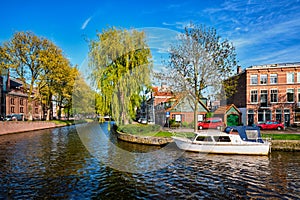 Boats, houses and canal. Harlem, Netherlands