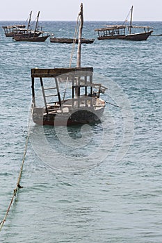 Boats in the Indian Ocean in the Zanzibar archipelago. Formerly