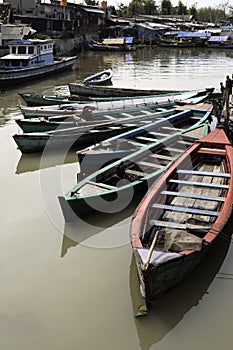 Boats in Jakarta slum photo