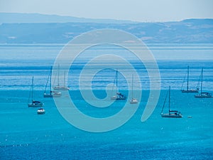 Boats in La Pelosa Beach, Stintino, Italy