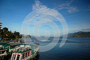 Boats on Lake Toba photo