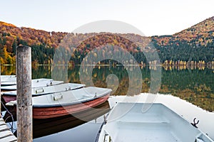Boats at lakeside, beautiful unique vulcanic lake at autumn, Lake Saint Ana