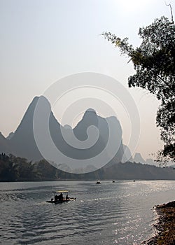 Boats on the Li River between Guilin and Yangshuo in Guangxi Province, China