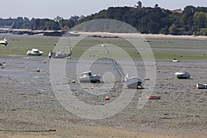 Boats in low tide in Cancal