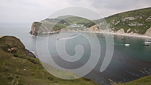 Boats in Lulworth Cove Dorset England UK