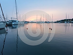 Boats, marina at dawn, sunrise clouds, Thessaloniki Greece