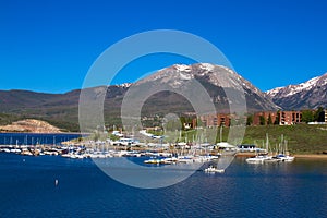 Marina and Rocky Mountain peaks at Dillon Reservoir photo