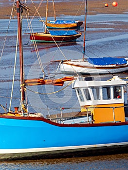 Boats at Meol beach The Wirral group of boats on there moorings at low tide