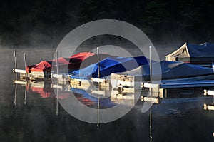 Boats in the mist of morning