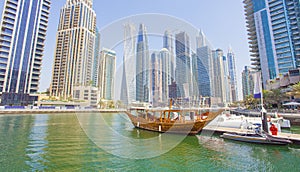 Boats and modern buildings in Dubai Marina