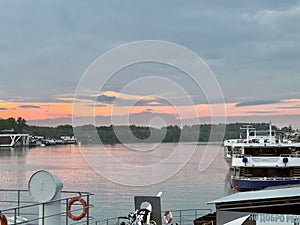 Boats moored along the riverside at dusk. Belgrade, Serbia