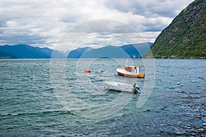 Boats moored at the bay of Sognefjord