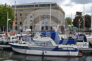 Boats Moored at a City Harbour