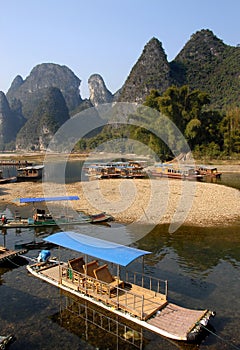 Boats moored on the Li River between Guilin and Yangshuo in Guangxi Province, China
