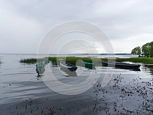 Boats are moored near the shore of lake Pleshcheyev.