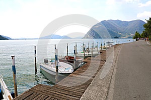 Boats moored in Peschiera Maraglio with Lake Iseo on the background, Monte Isola, Italy