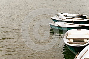 Boats moored at the pier for walks on the lake