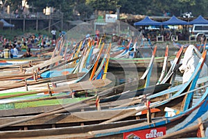 Boats moored at Taungthaman Lake near Amarapura in Myanmar by the U Bein Bridge