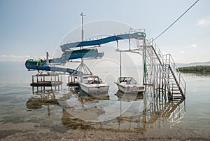 Boats moored under abandoned slide, Struga, Macedonia