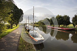 Boats moored at the waterfront in municipality Midden-Delfland