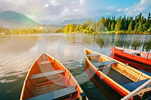 Boats on mountain lake Strbske pleso in Slovakia.