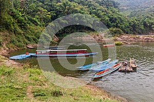 Boats on Nam Ou river in Hat Sa village in Phongsali province, La