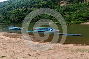 Boats at Nam Ou river in Muang Khua town, La