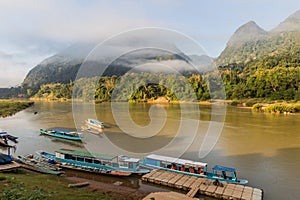 Boats at Nam Ou river in Muang Ngoi Neua village, La