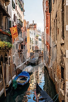 Boats in narrow canal, Venice, Italy