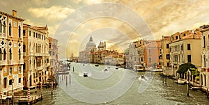 Boats navigating in the Grand Canal with church of Santa Maria della Salute, Venice, Italy