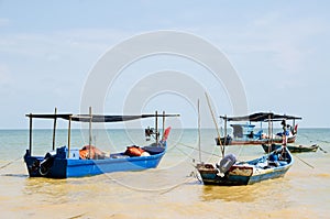 Boats near Malaysia tropic beach