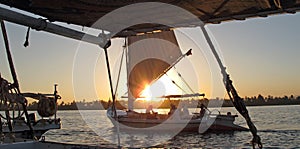 Boats on Nile river at sunset