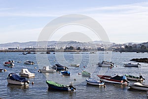 Boats in O Cocho beach in Alcabre neighborhood in Vigo, Spain photo