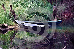 Boats over tranquil water