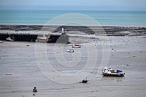Boats and oysterbanks of Cancale harbour in France