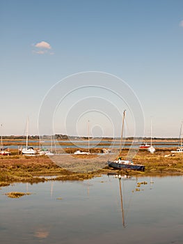Boats parked in stream river estuary in tollesbury maldon essex