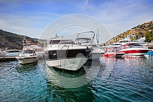 boats in the parking lot at the pier