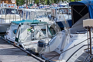 boats in the parking lot at the pier