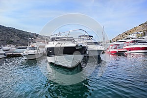 boats in the parking lot at the pier