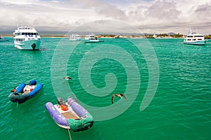 Boats and Pelicans in Galapagos