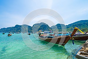 Boats in Phi Phi, Maya beach with blue turquoise seawater, Phuket island in summer season in travel holiday vacation trip. Andaman