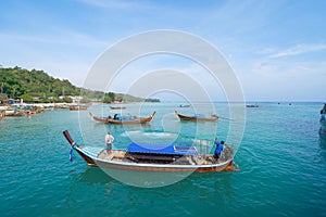 Boats in Phi Phi, Maya beach with blue turquoise seawater, Phuket island in summer season in travel holiday vacation trip. Andaman